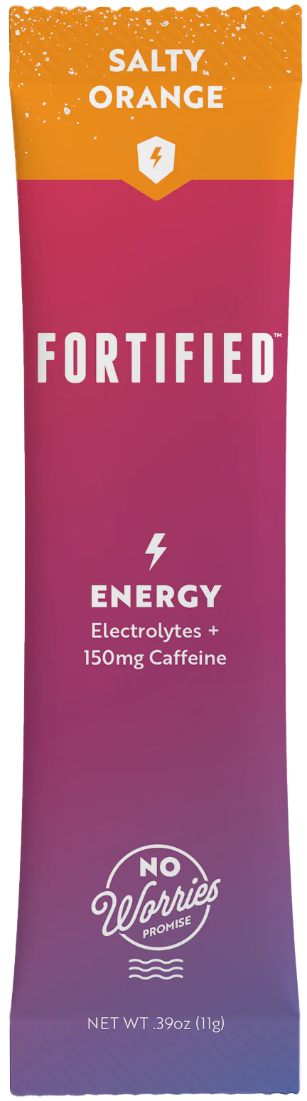 Fortified energy drink stick pack with salty and orange flavor on a purple background